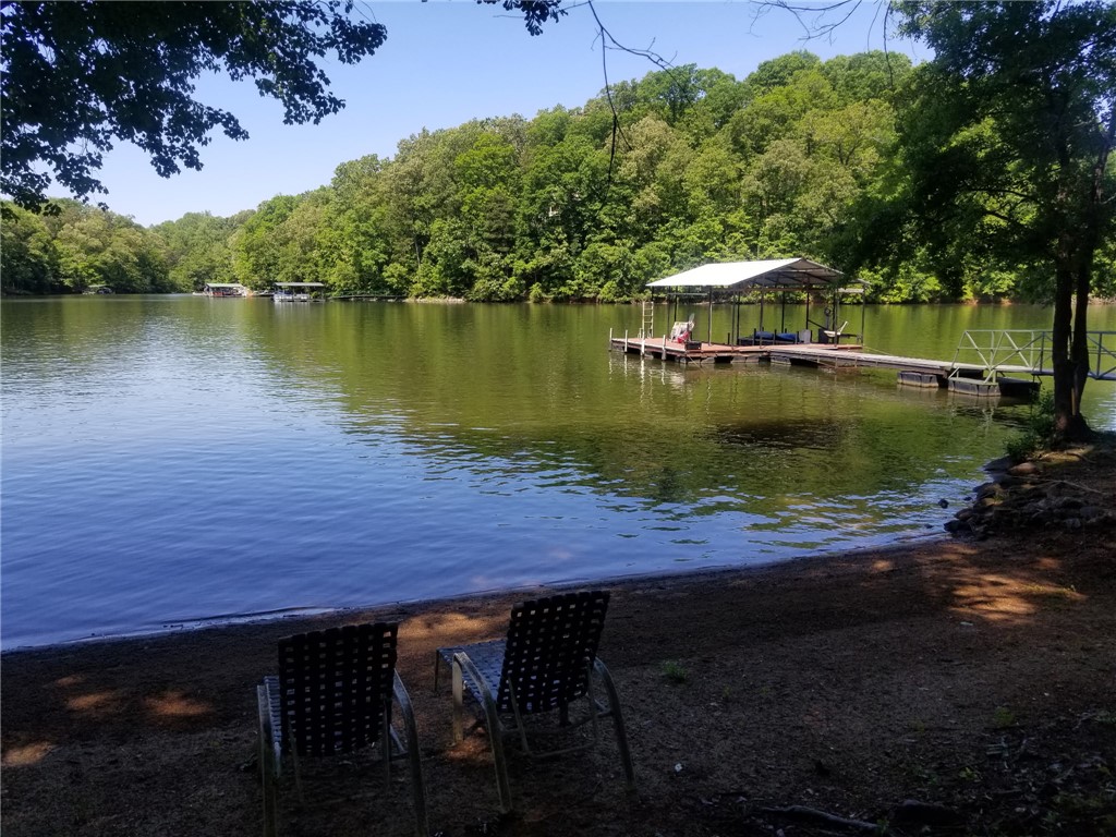 110 Snug Harbor Road Seneca, SC 29678 - Photo 3 of 37 Enjoy tranquil lake views and direct access to the water from this peaceful retreat. Picture taken at full pond.