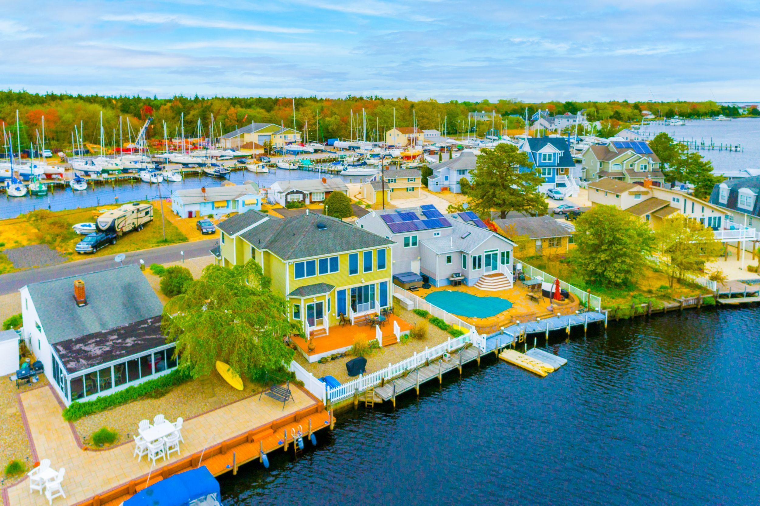 94 Cedar Run Road Bayville, NJ 08721 - Photo 3 of 43 an aerial view of a house with a ocean view