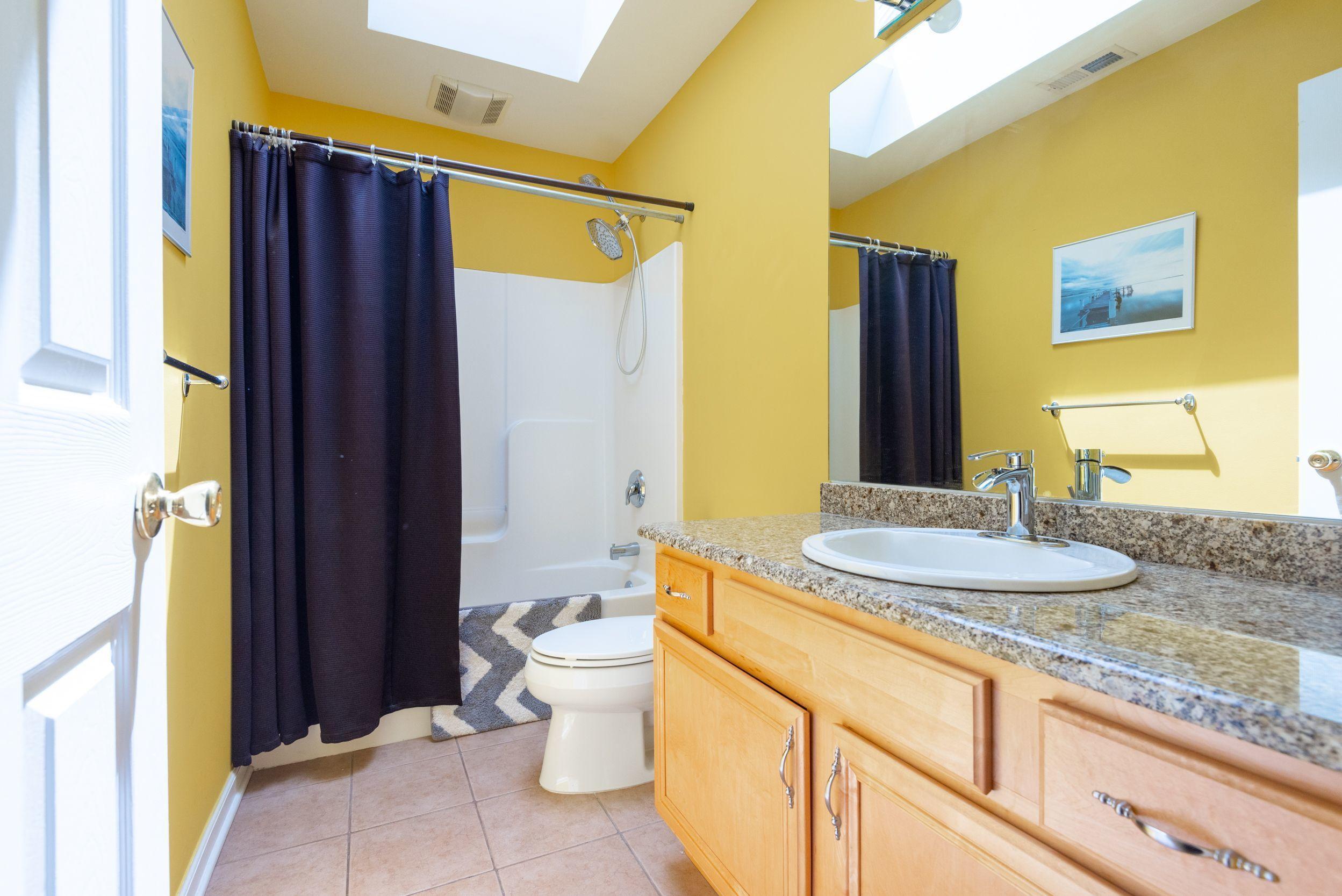 94 Cedar Run Road Bayville, NJ 08721 - Photo 30 of 43 a bathroom with a granite countertop sink and a mirror