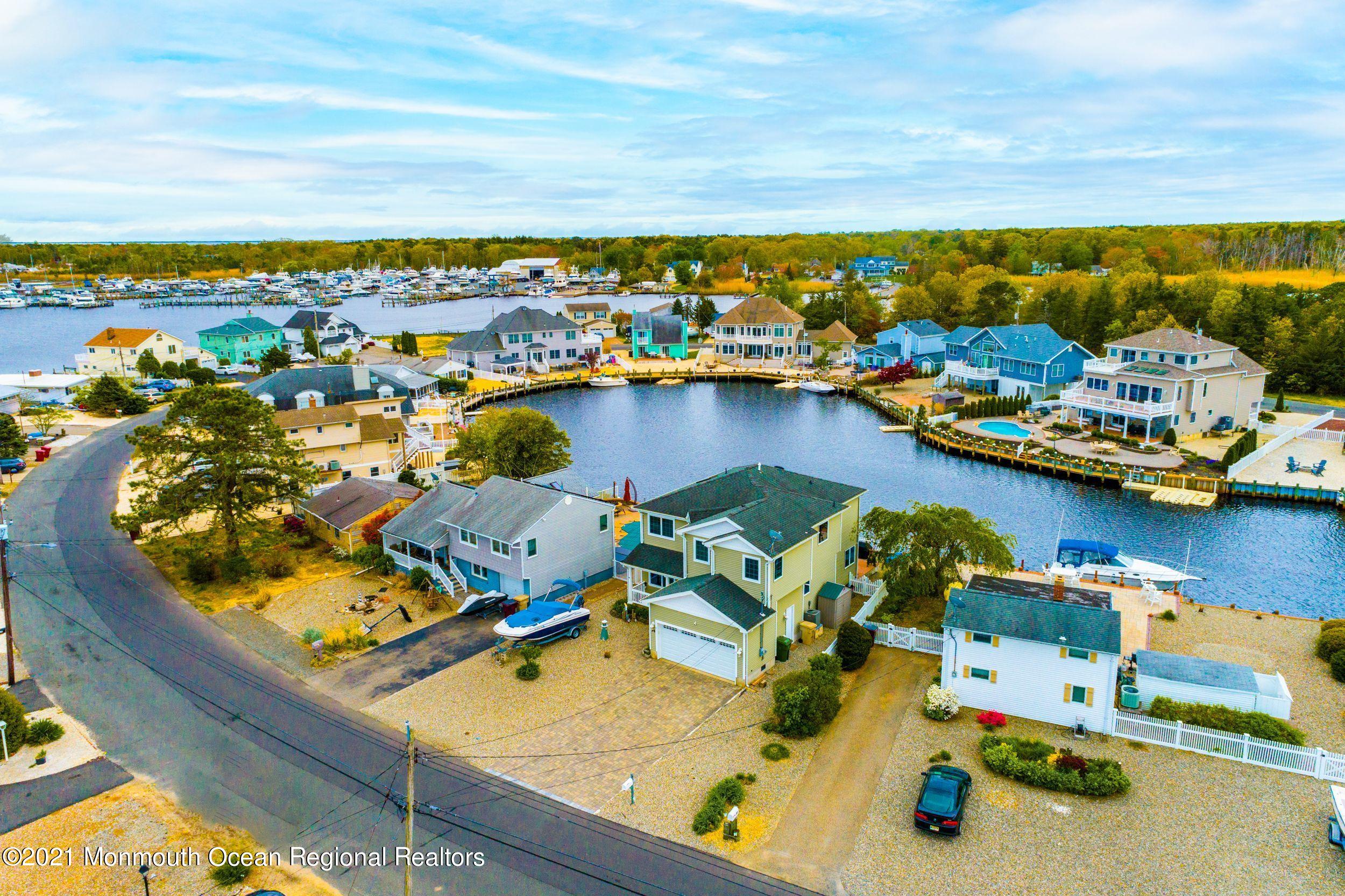 94 Cedar Run Road Bayville, NJ 08721 - Photo 40 of 43 an aerial view of a house with a ocean view