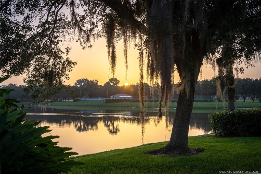 1313 Southwest Balmoral Trace Stuart, FL 34997 - Photo 12 of 70 Sunrise across the lake