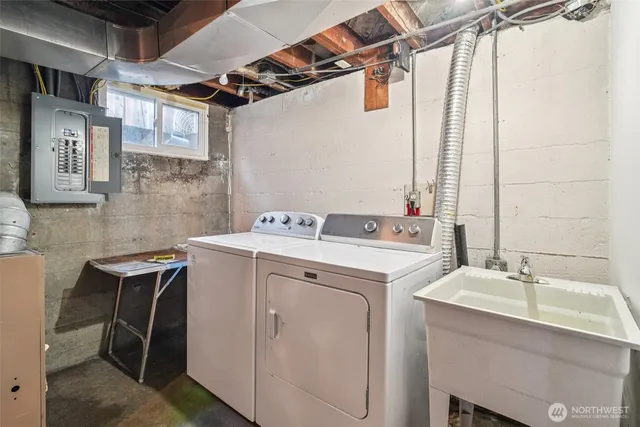 a utility room with dryer and washer