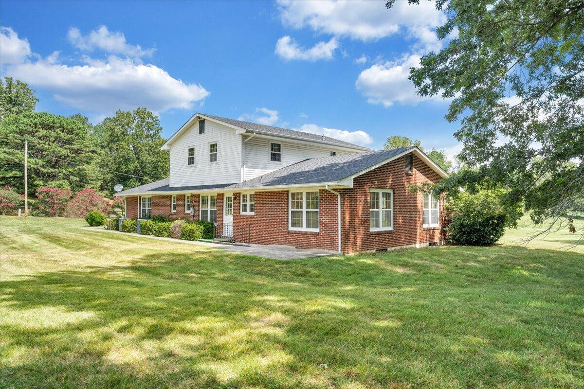 2324 Camp Jaycee Road Blue Ridge, VA 24064 - Photo 47 of 74 a view of a house with a yard