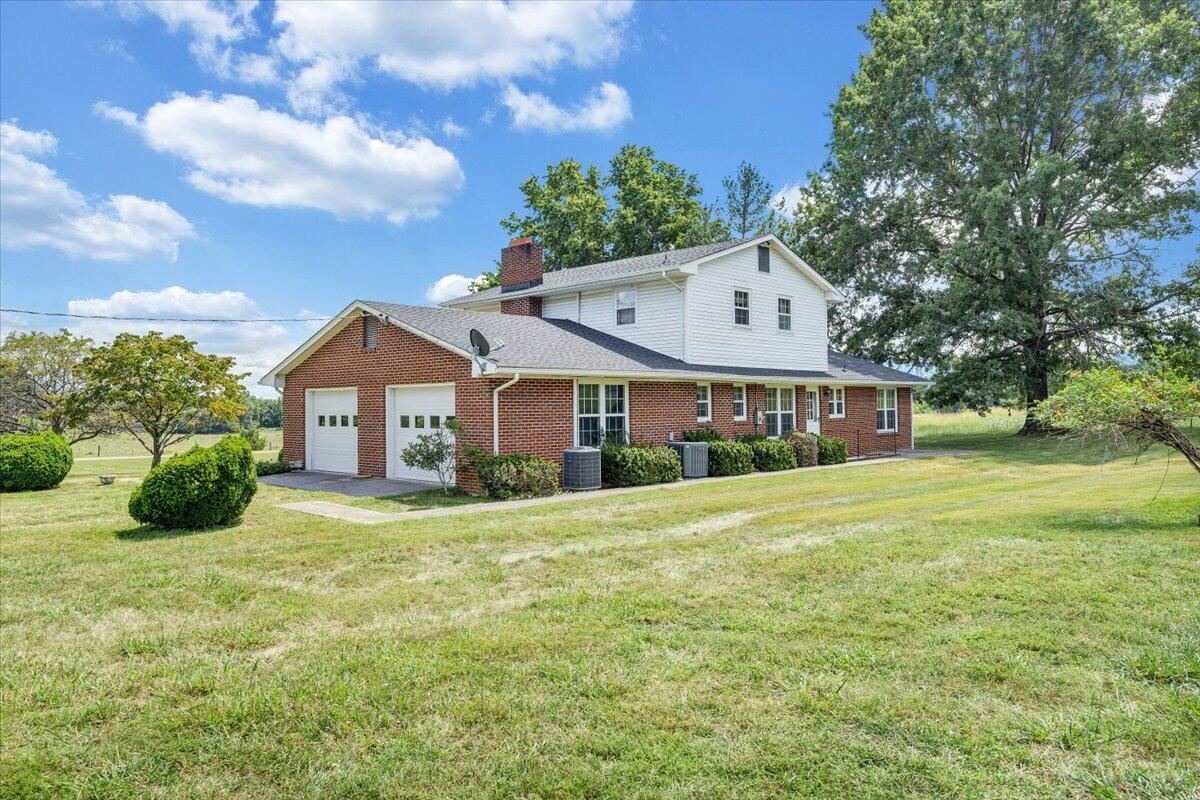 2324 Camp Jaycee Road Blue Ridge, VA 24064 - Photo 52 of 74 a front view of a house with garden