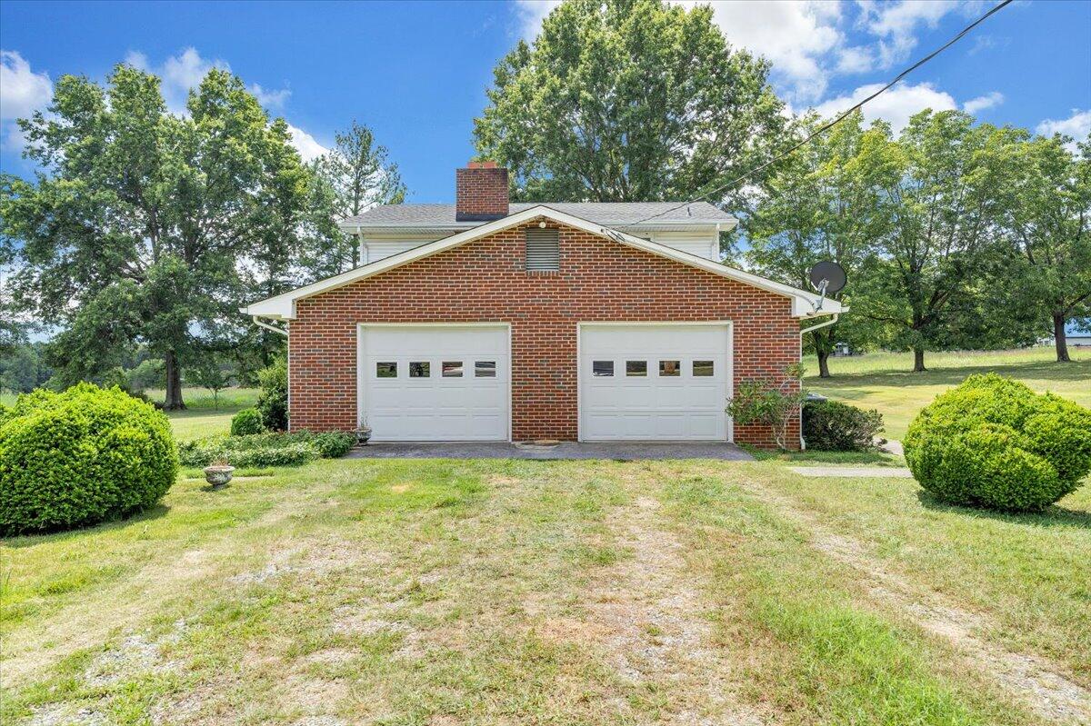 2324 Camp Jaycee Road Blue Ridge, VA 24064 - Photo 53 of 74 a view of a house with a yard