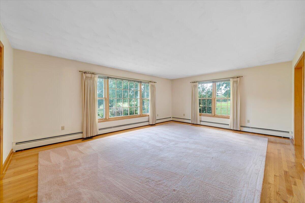 2324 Camp Jaycee Road Blue Ridge, VA 24064 - Photo 7 of 74 an empty room with windows