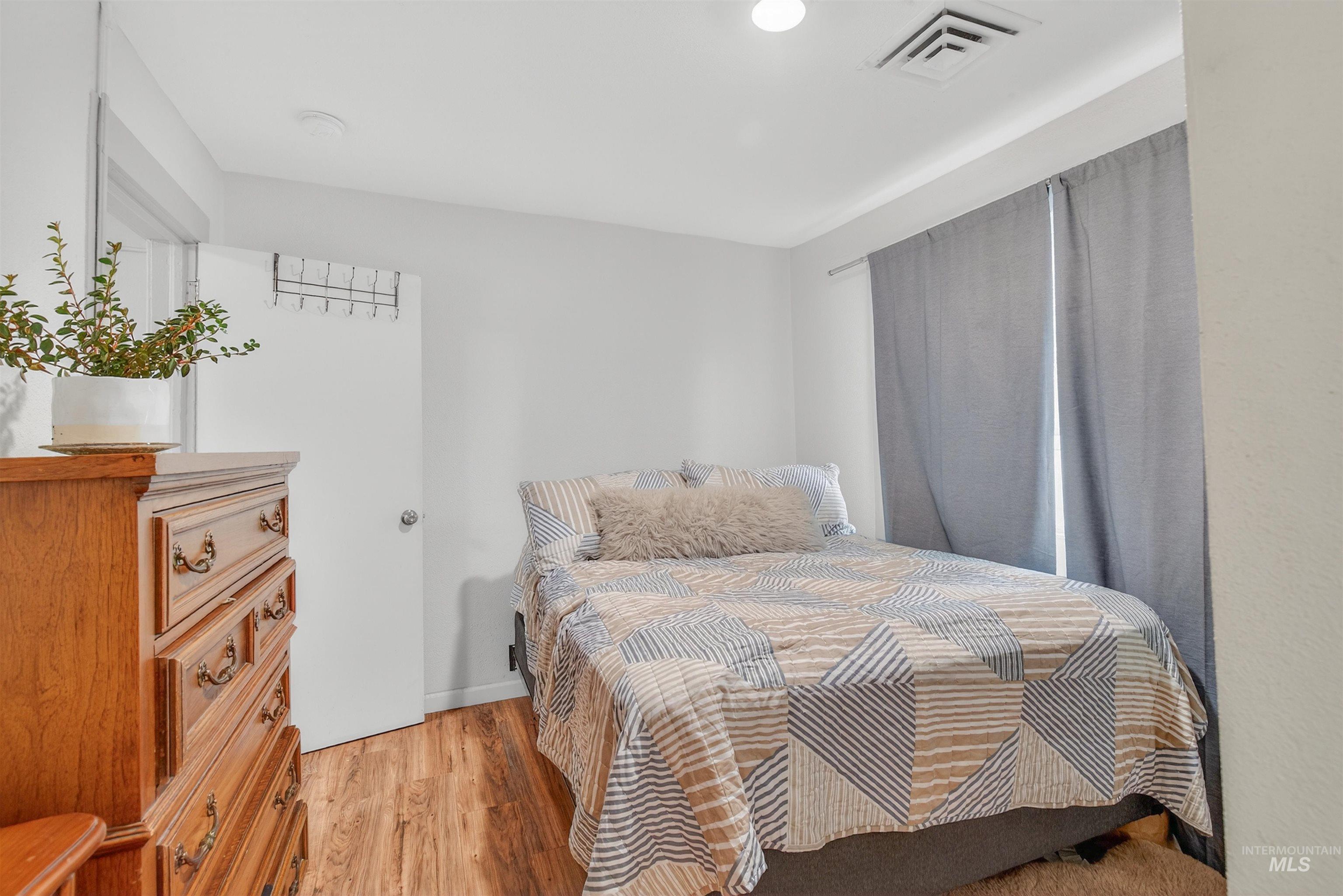 601 12th Street Clarkston, WA 99403 - Photo 6 of 21 Bedroom featuring light wood-type flooring