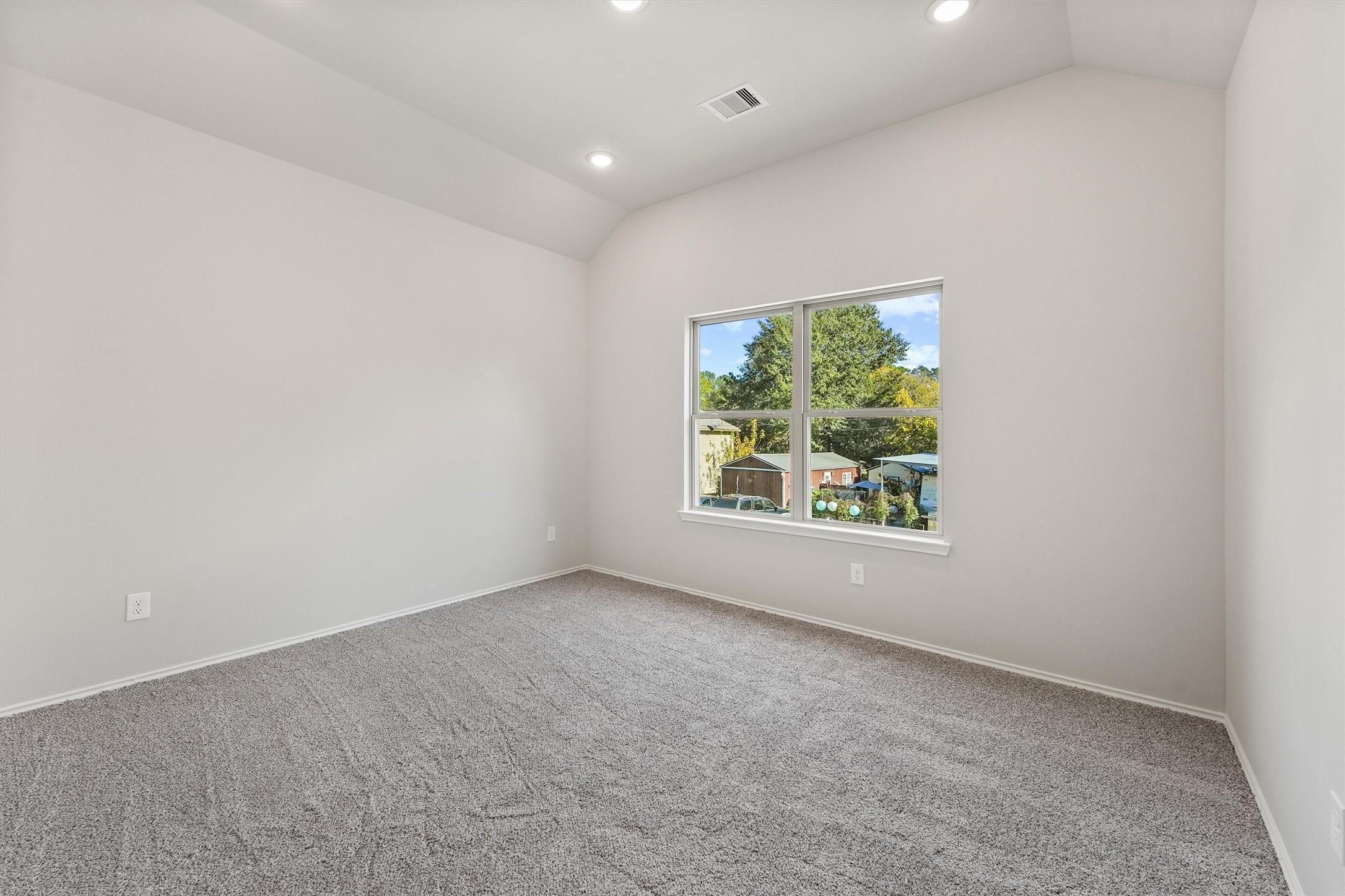 8687 Sassafras Willis, TX 77318 - Photo 22 of 32 an empty room with windows