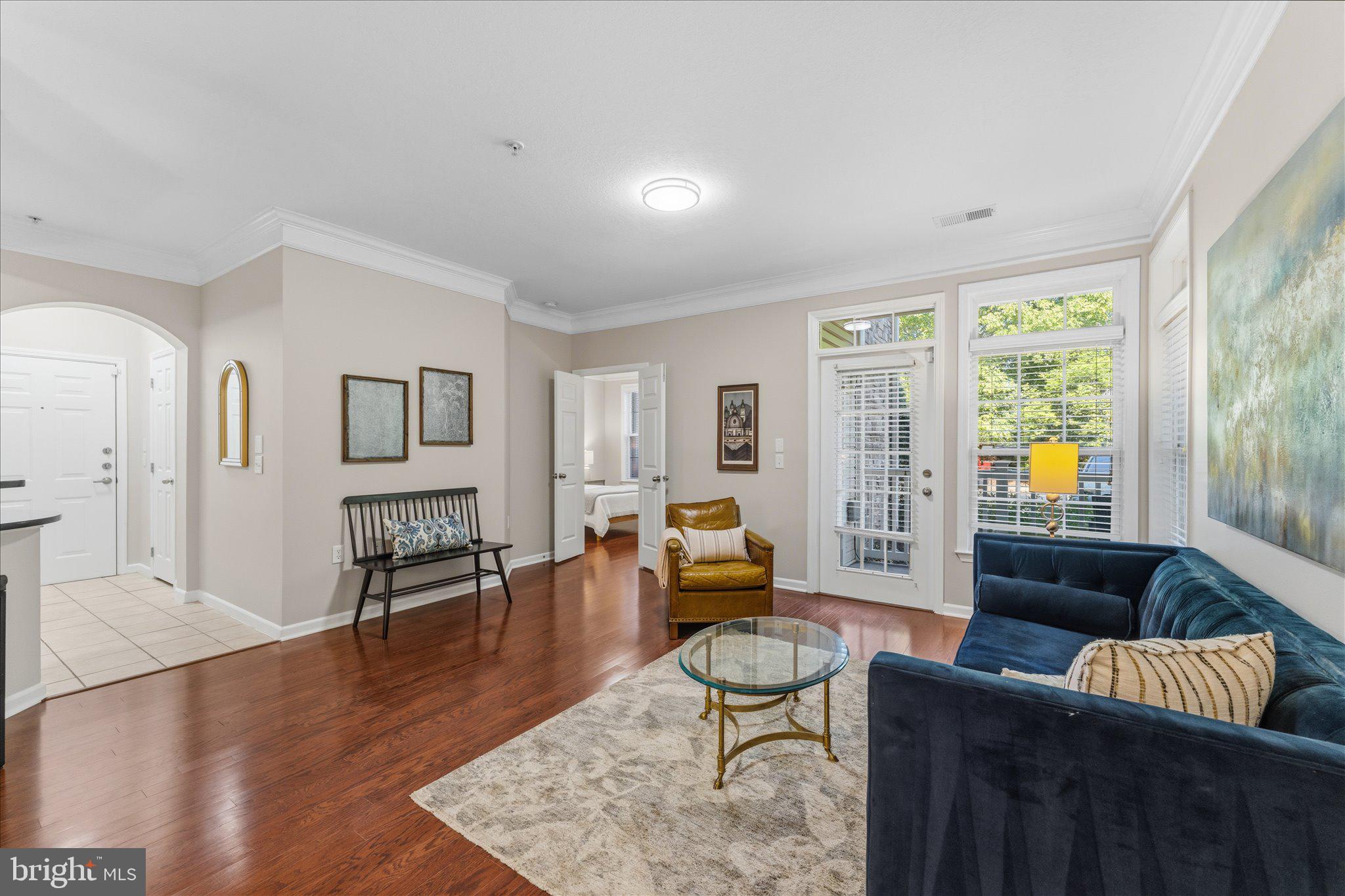 503 Sunset View Terrace Southeast, Unit 101 Leesburg, VA 20175 - Photo 11 of 39 Bright and inviting living space.