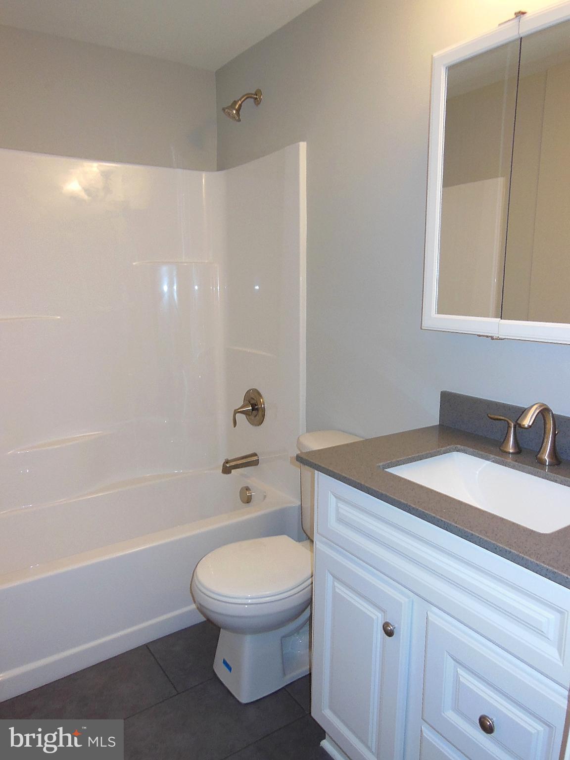 4813 Valley Forge Road Randallstown, MD 21133 - Photo 21 of 29 Bath has granite counter & laminate flooring