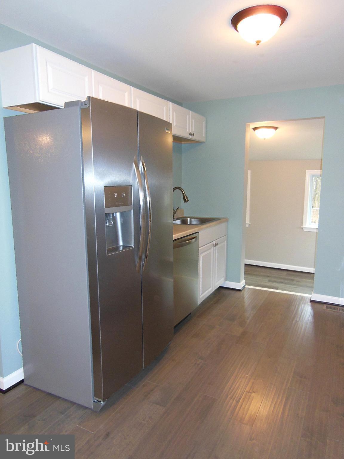 4813 Valley Forge Road Randallstown, MD 21133 - Photo 10 of 29 Kitchen faucet has a built-in sprayer