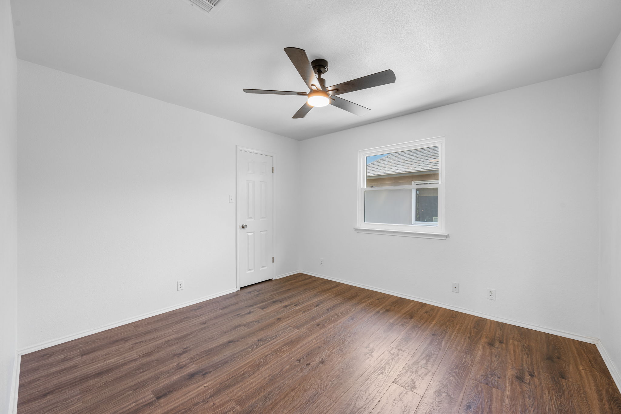 2440 Madeline Loop Cedar Park, TX 78613 - Photo 24 of 33 Unfurnished room featuring dark wood-type flooring and ceiling fan