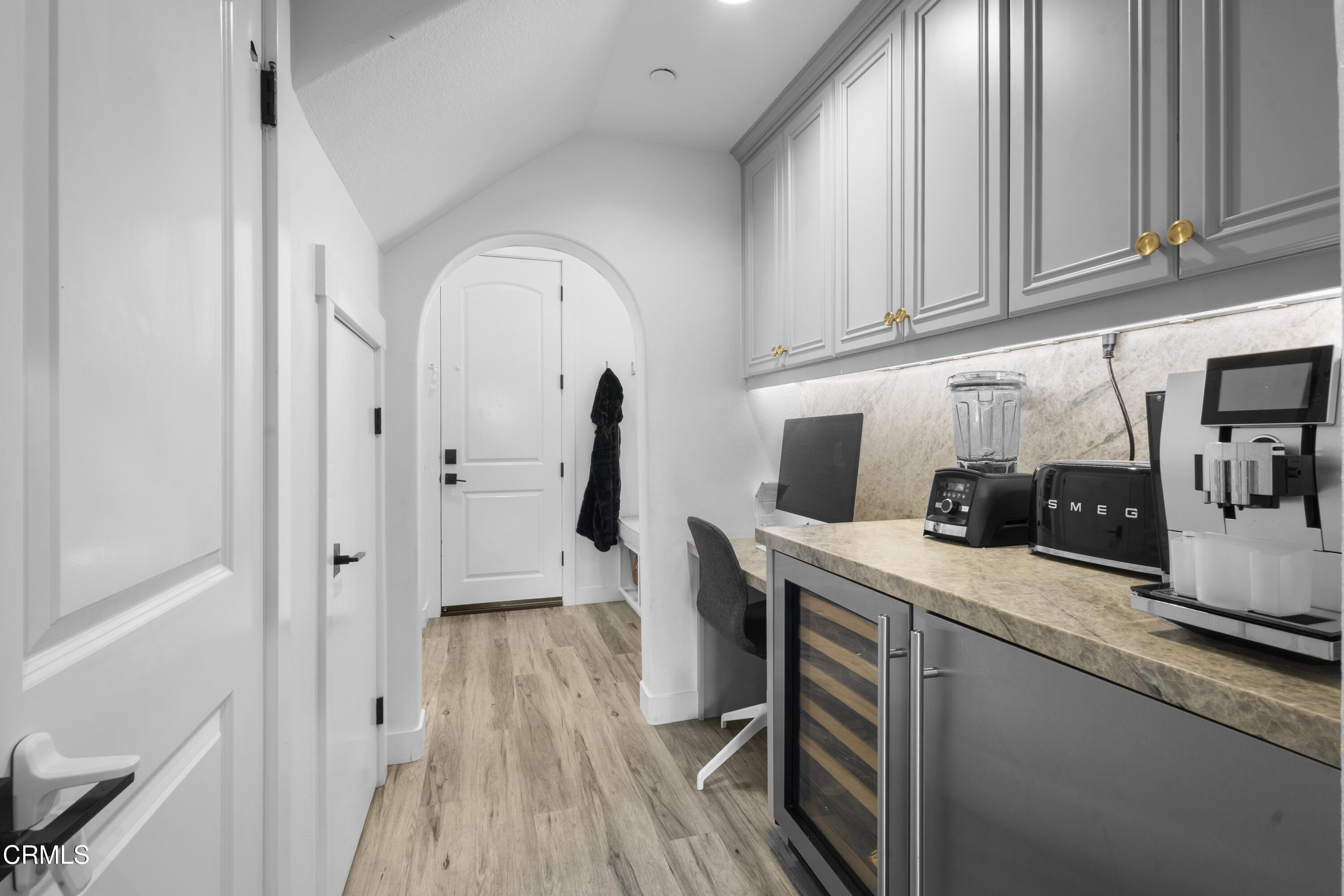 4173 Caribbean Street Oxnard, CA 93035 - Photo 13 of 64 a kitchen with a sink a refrigerator and cabinets