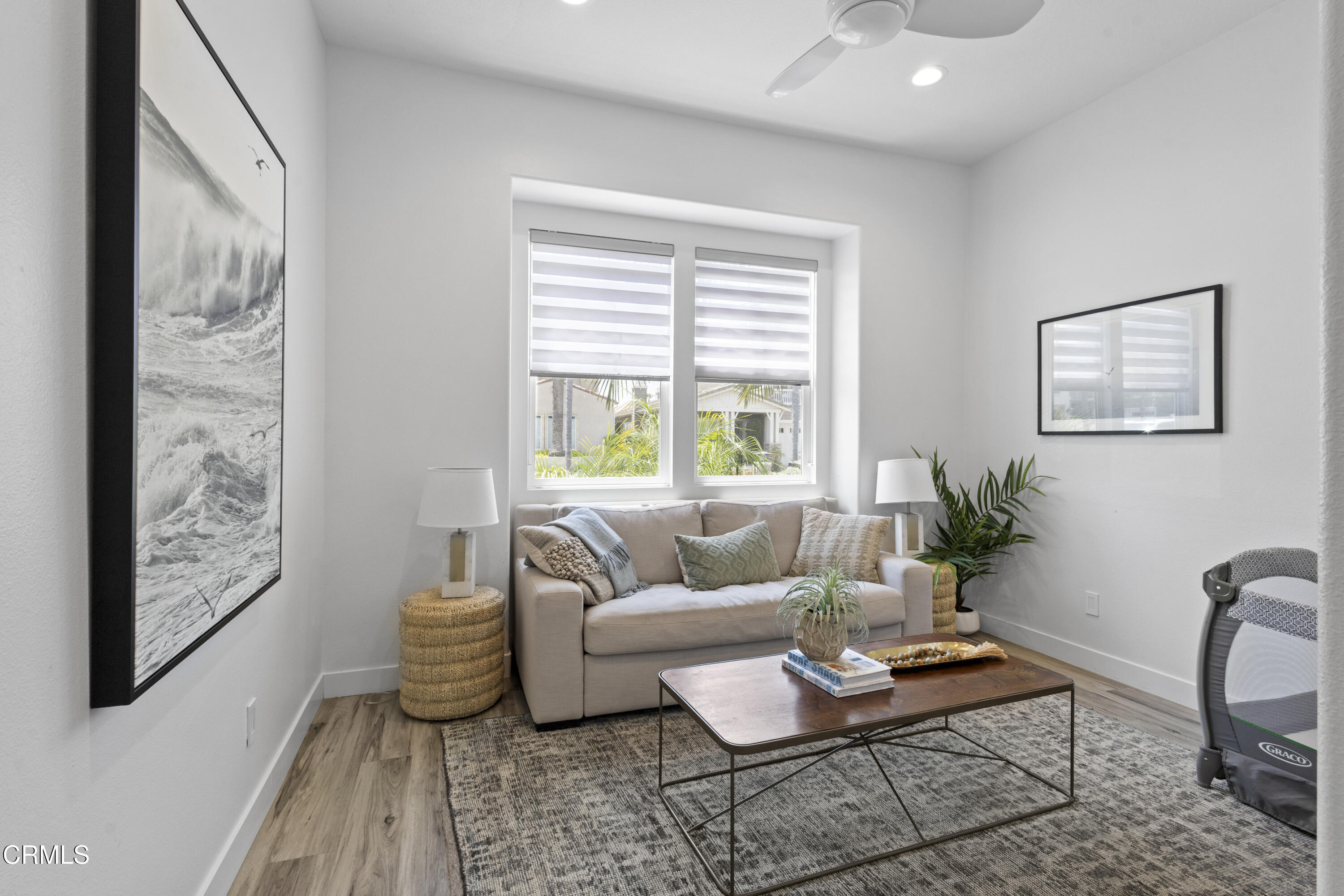 4173 Caribbean Street Oxnard, CA 93035 - Photo 14 of 64 a living room with furniture and wooden floor