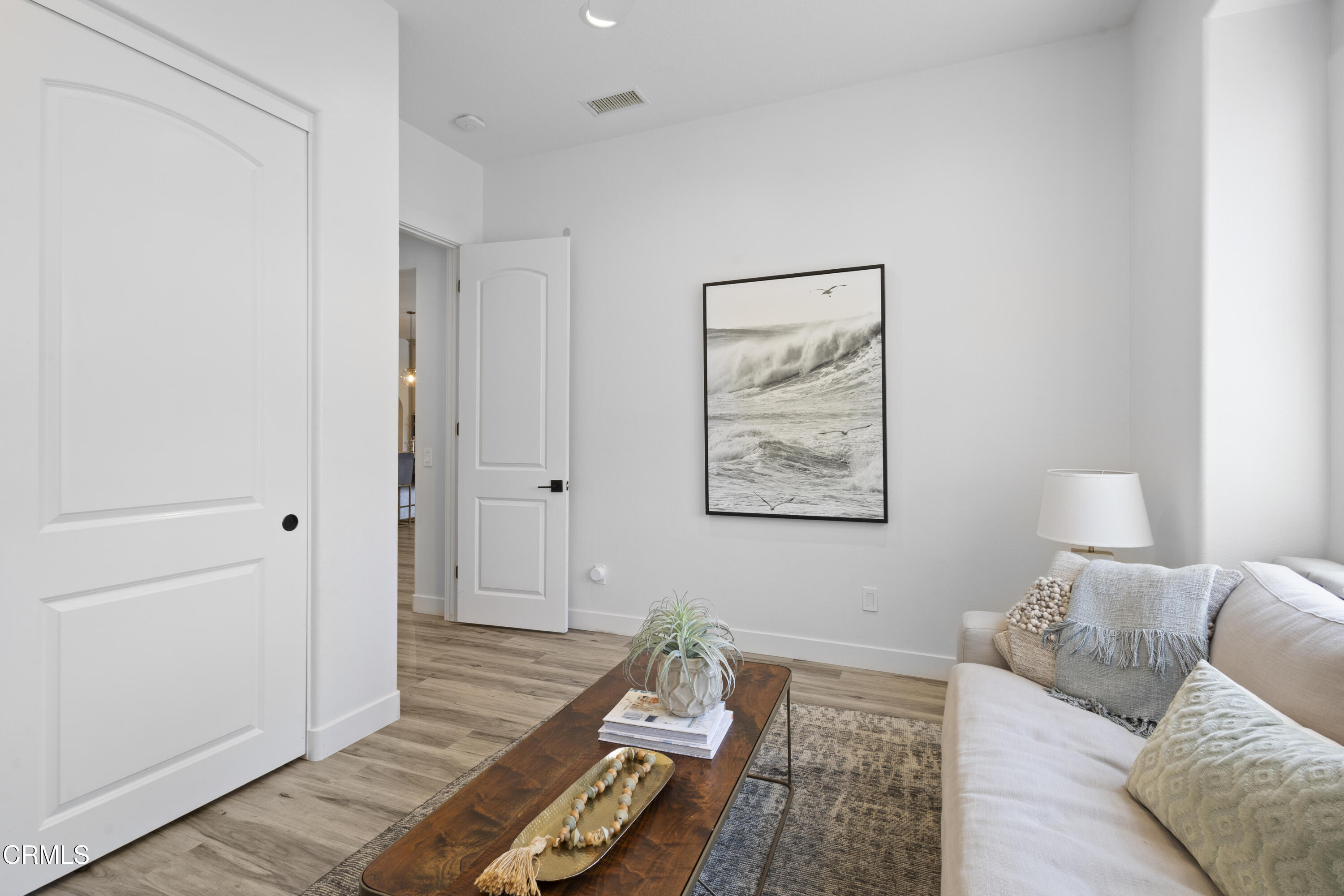 4173 Caribbean Street Oxnard, CA 93035 - Photo 15 of 64 a bed room with a bed and a couch