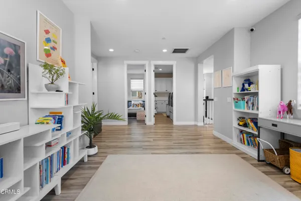 a bedroom with furniture and a bed