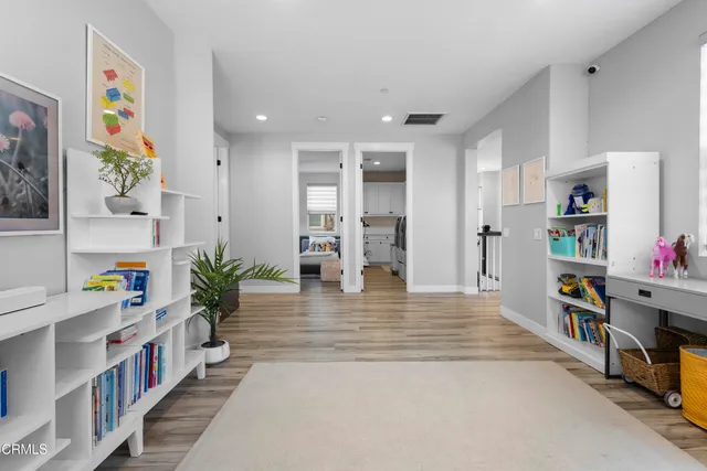 a bedroom with furniture and a bed