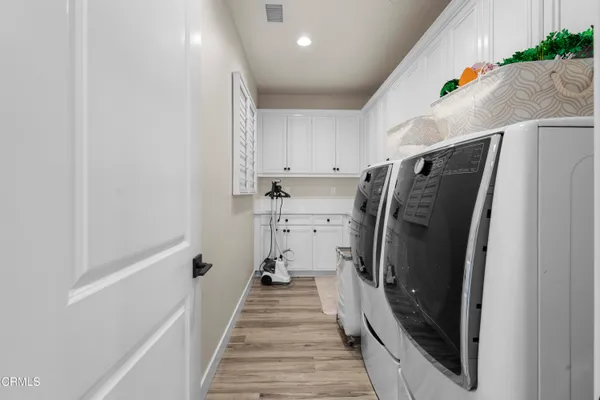 a bedroom with a bed and a window in it
