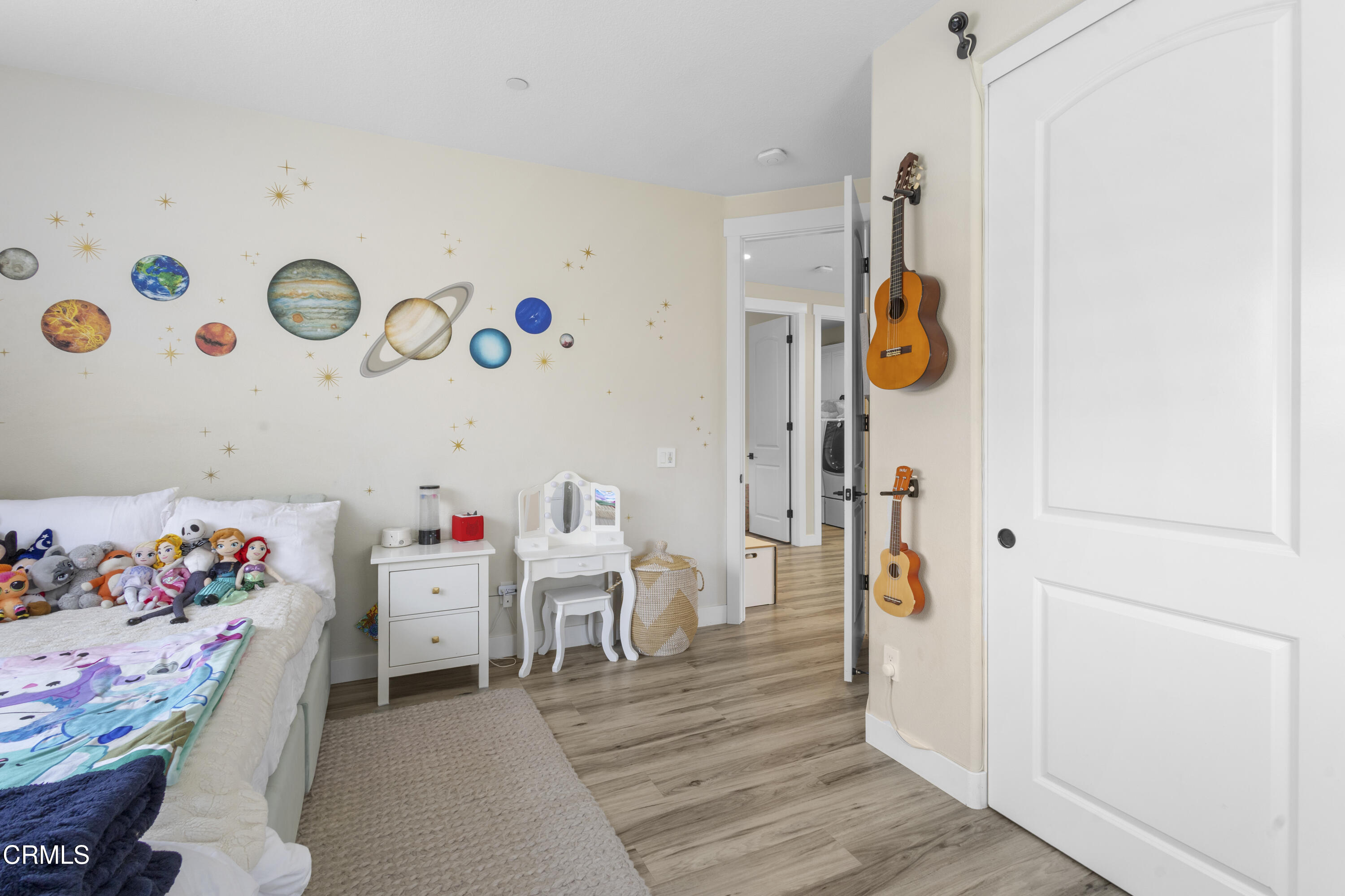 4173 Caribbean Street Oxnard, CA 93035 - Photo 31 of 64 a bedroom with a bed and a window in it