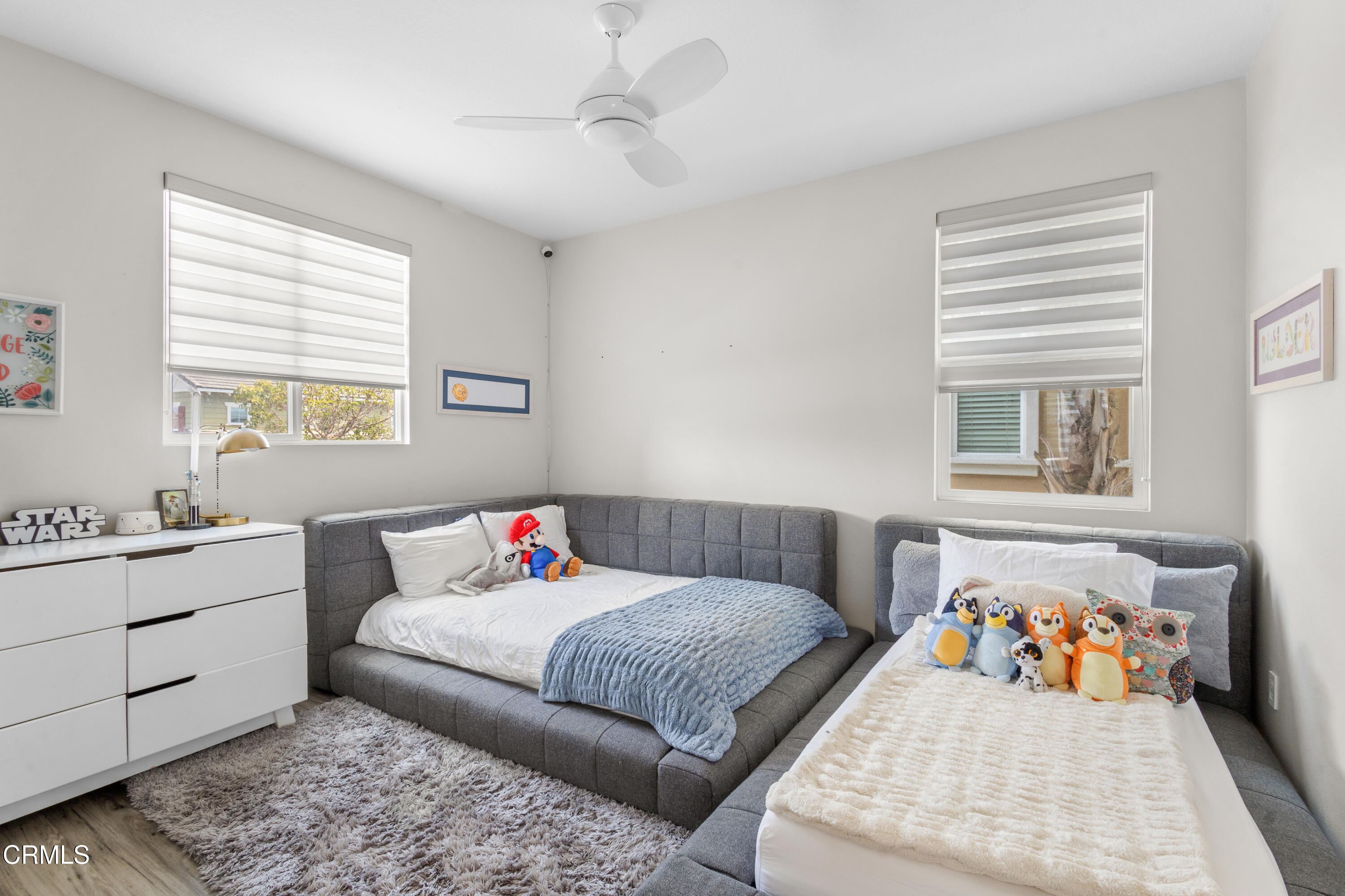 4173 Caribbean Street Oxnard, CA 93035 - Photo 32 of 64 a bedroom with a bed and a window