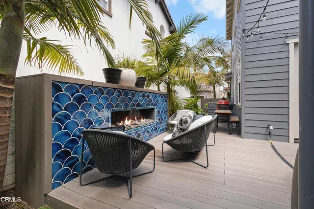 a view of a swimming pool and lounge chairs