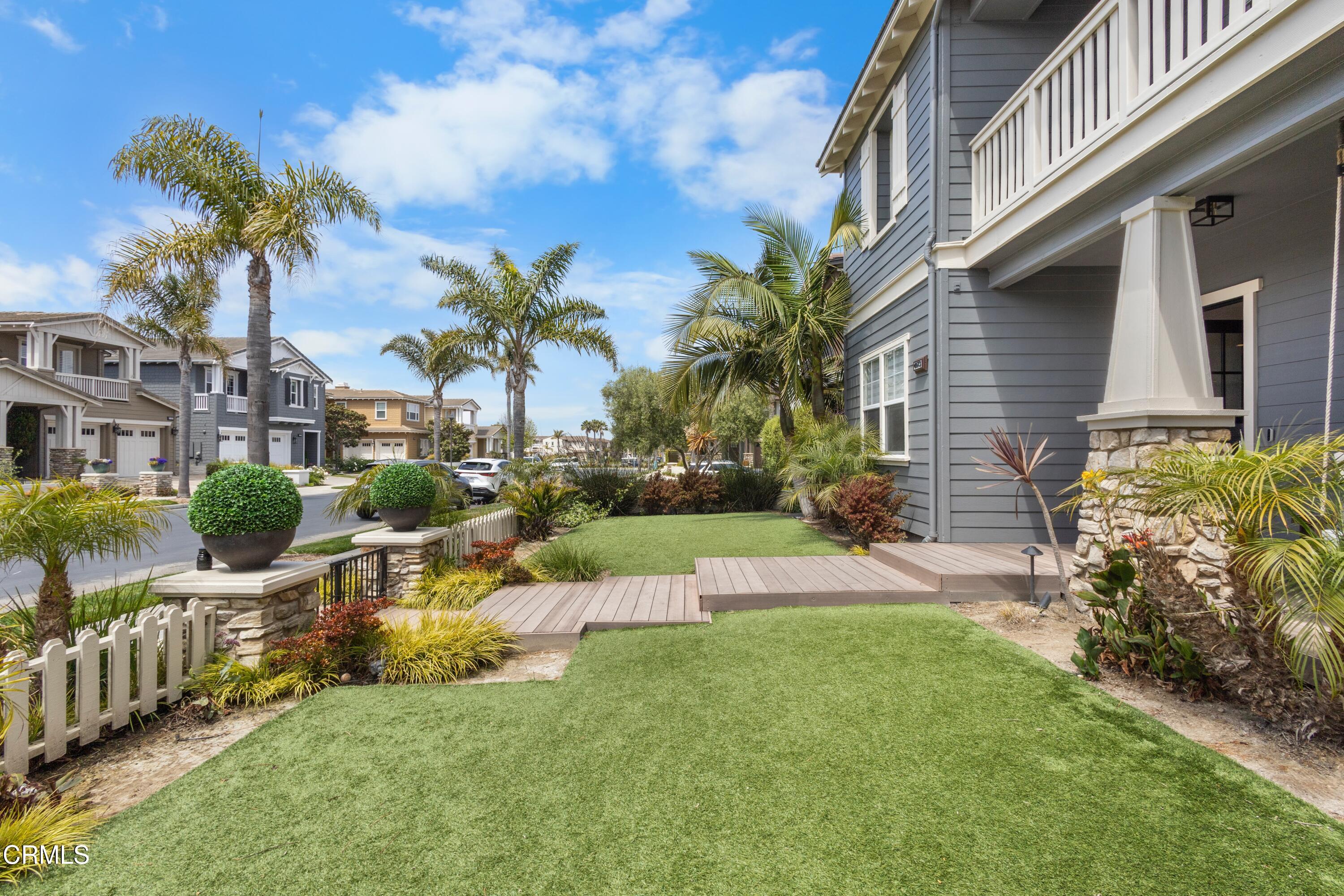 4173 Caribbean Street Oxnard, CA 93035 - Photo 49 of 64 a view of backyard of house with outdoor seating