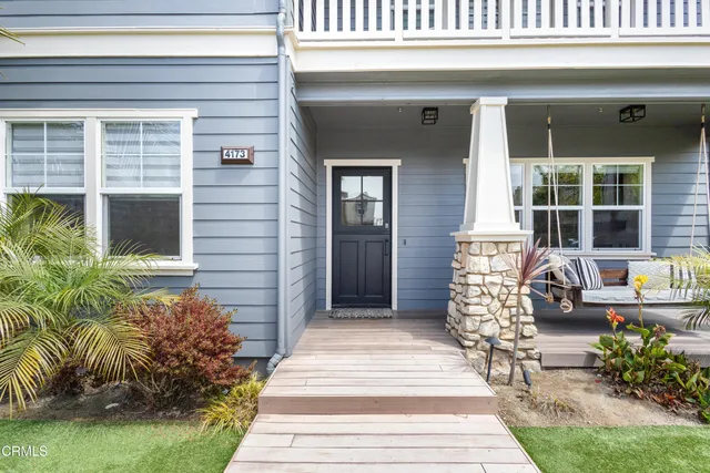 a view of a city with an ocean view