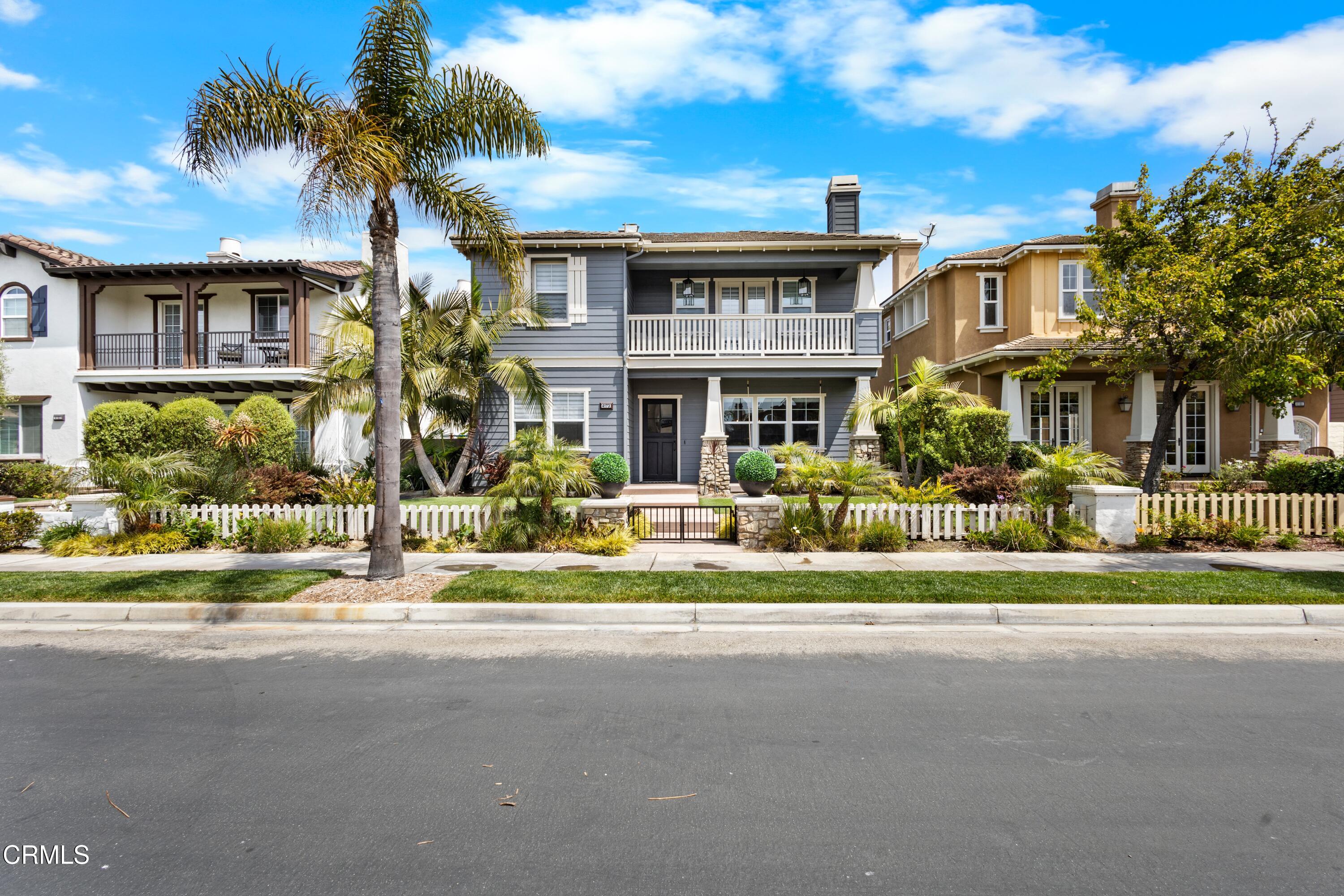 4173 Caribbean Street Oxnard, CA 93035 - Photo 53 of 64 a front view of house with yard and green space
