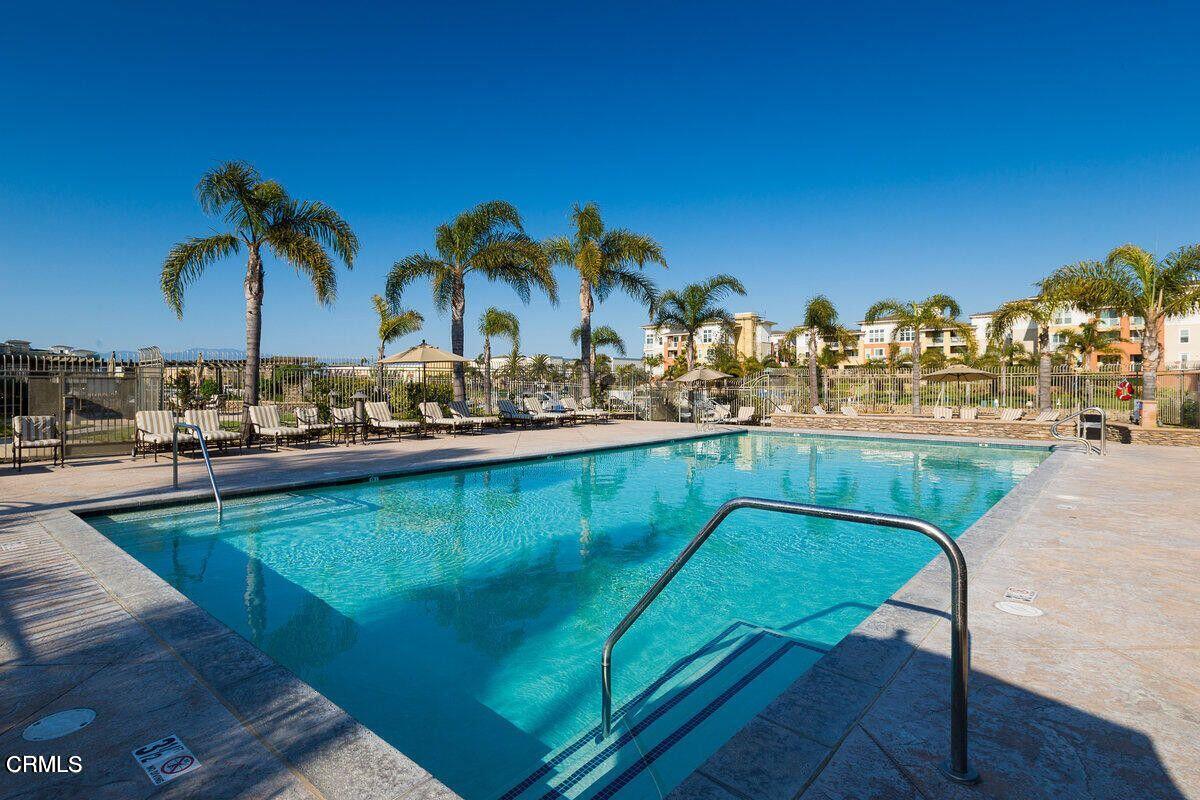4173 Caribbean Street Oxnard, CA 93035 - Photo 59 of 64 a view of a swimming pool and lounge chairs
