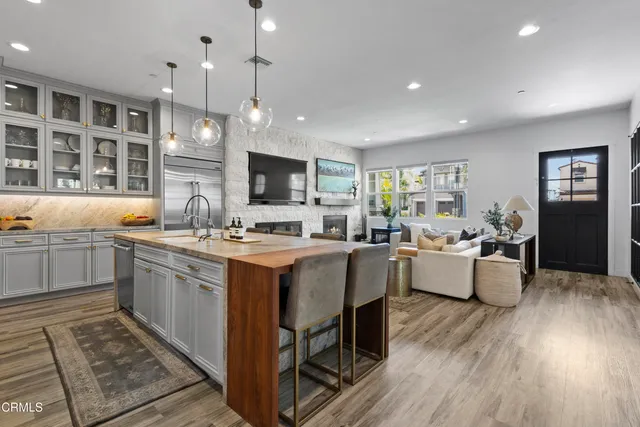 a view of a livingroom with furniture and window