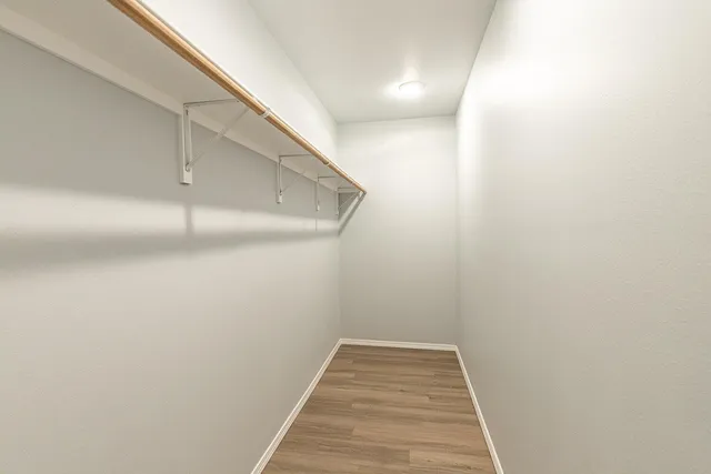 a view of a room with racks on the wall