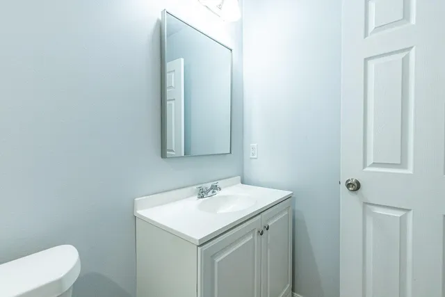 a bathroom with a sink and a toilet
