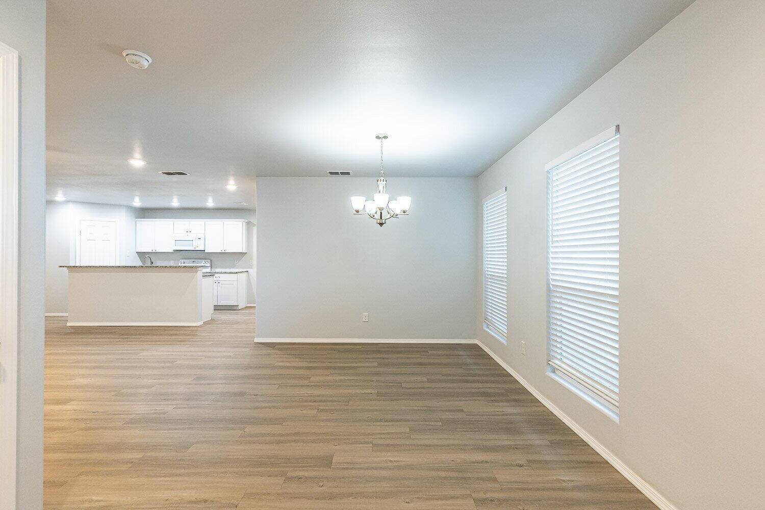 5517 Kemper Street, Unit A Lubbock, TX 79416 - Photo 9 of 25 a view of a kitchen with a sink and a dishwasher