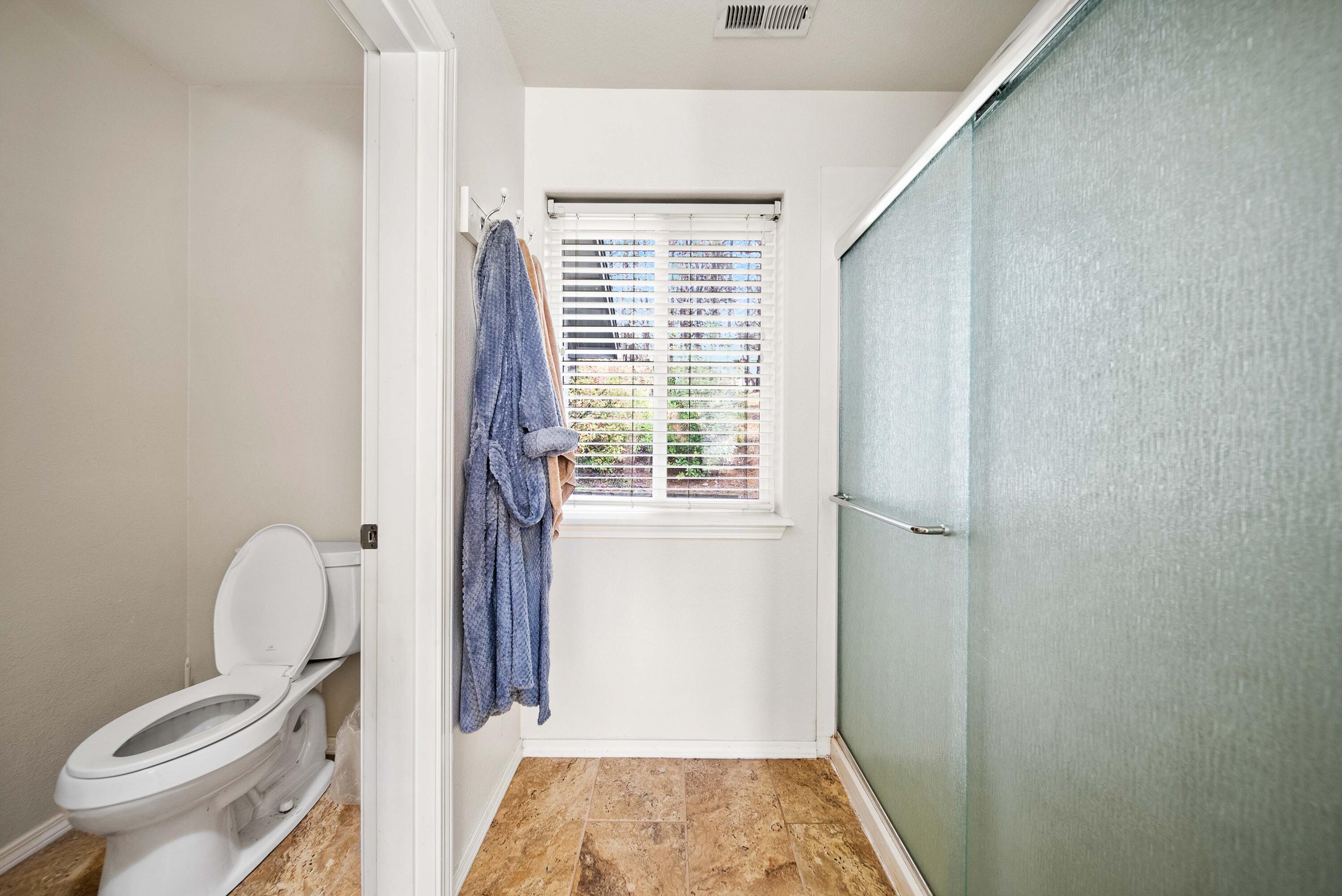 1280 Crow Road Merlin, OR 97532 - Photo 17 of 44 a bathroom with a toilet and a shower