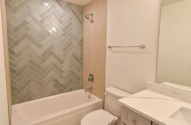 a bathroom with a sink and a toilet