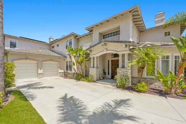 a living room with furniture tv and a large window