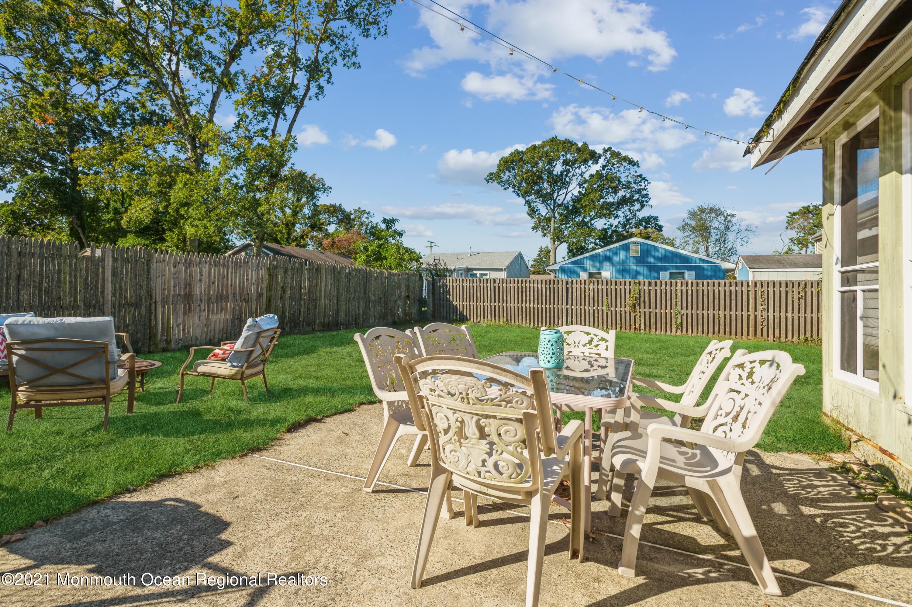 542 Lloyd Road Toms River, NJ 08753 - Photo 18 of 20 a view of chair and tables