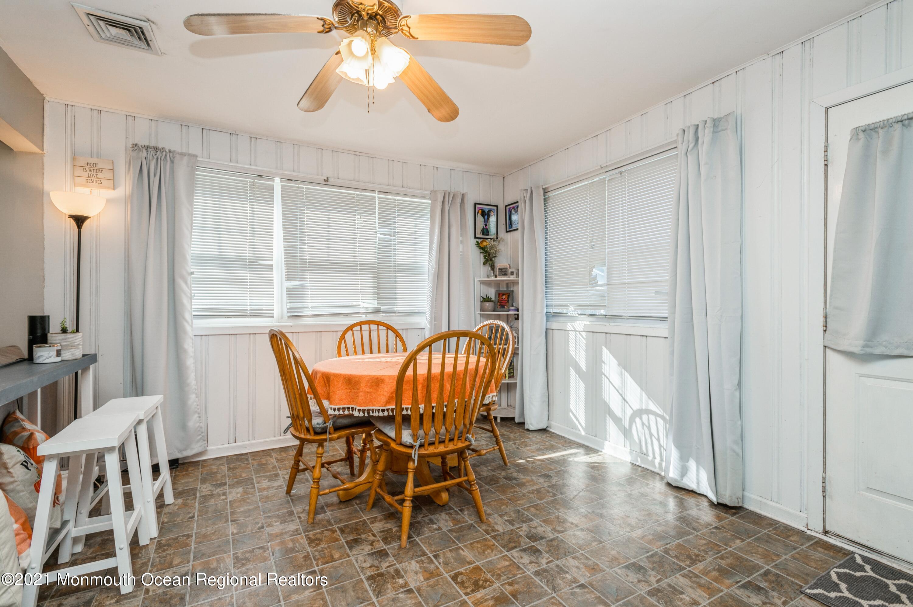 542 Lloyd Road Toms River, NJ 08753 - Photo 7 of 20 a dining room with furniture and window