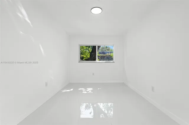 an empty room with a window