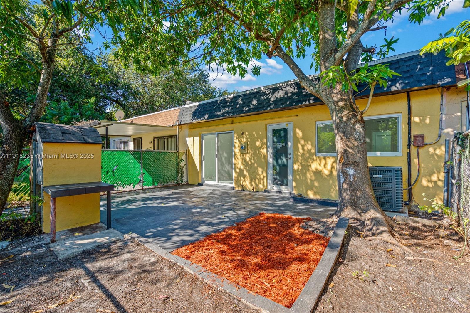 3956 Northwest 207 St Road Miami Gardens, FL 33055 - Photo 32 of 36 a view of outdoor space yard and patio