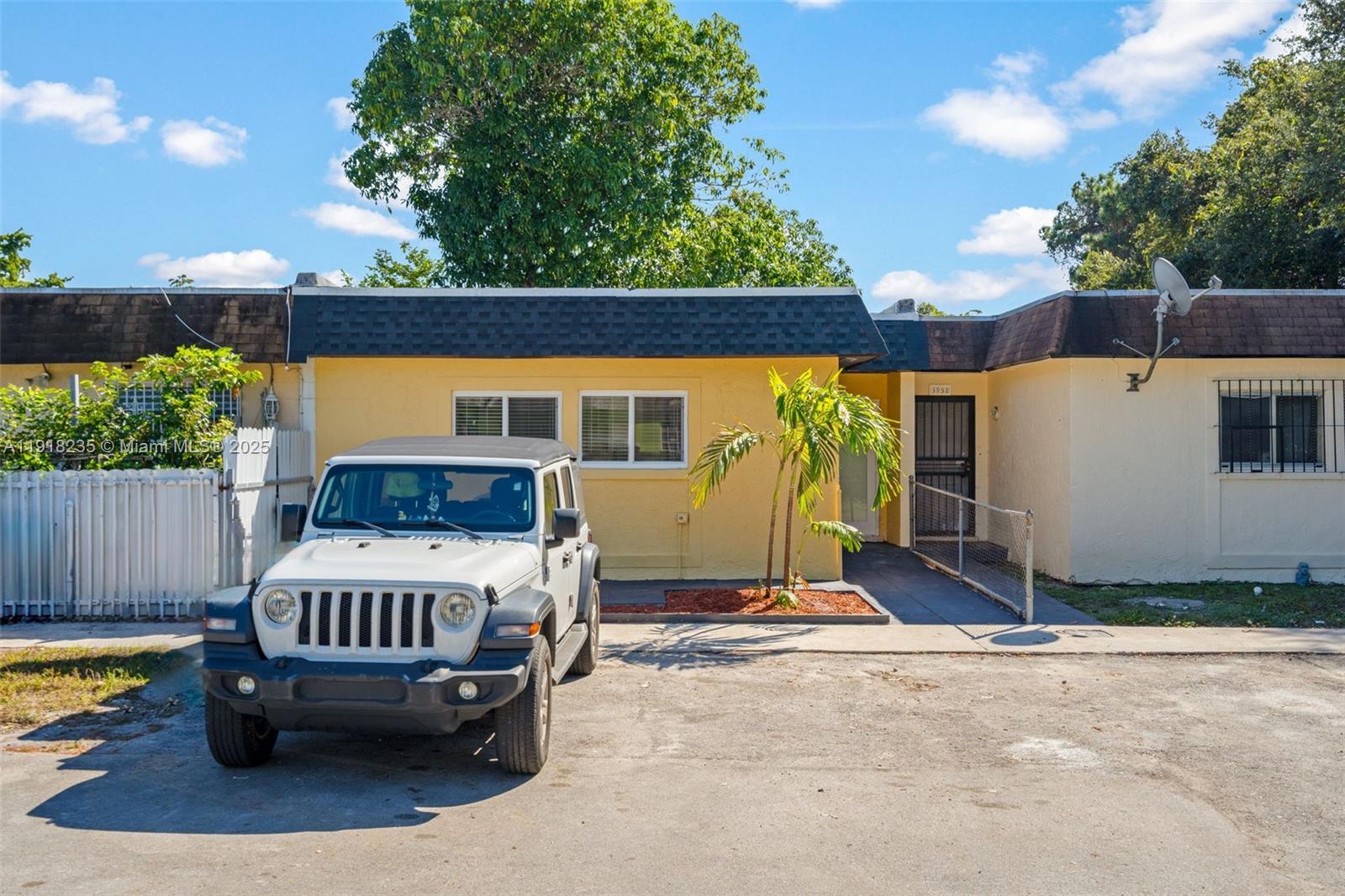 3956 Northwest 207 St Road Miami Gardens, FL 33055 - Photo 35 of 36 a view of a swimming pool with a patio