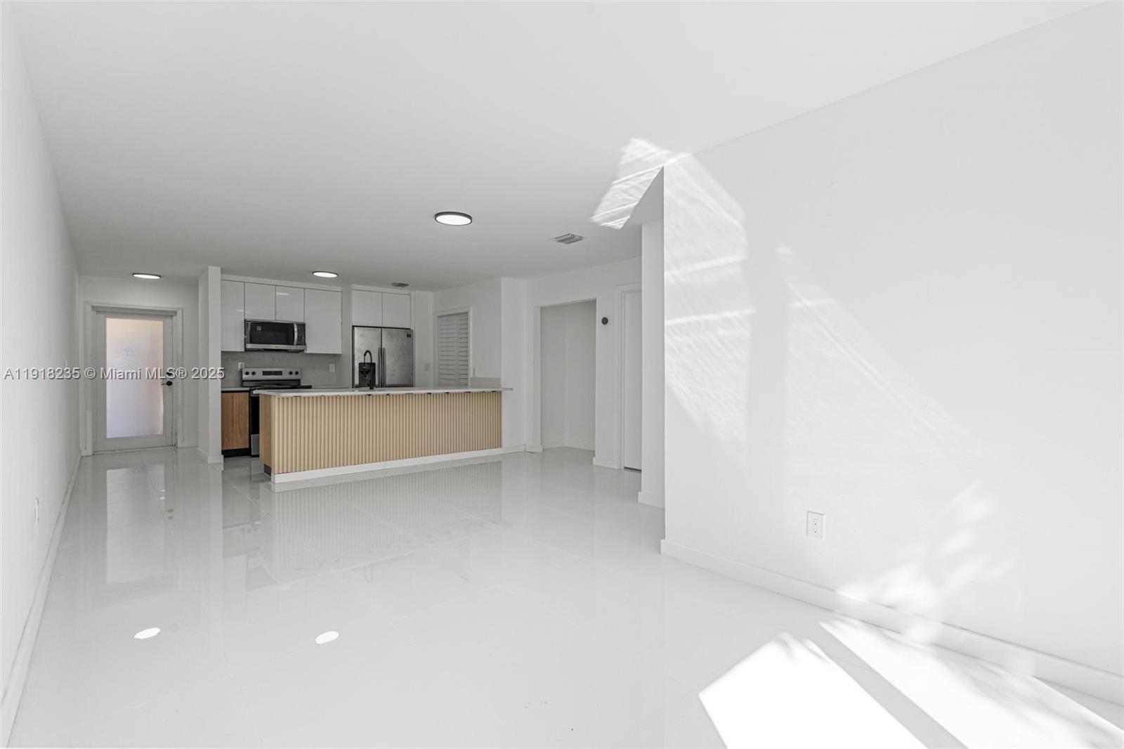 3956 Northwest 207 St Road Miami Gardens, FL 33055 - Photo 8 of 36 a view of a kitchen with a sink