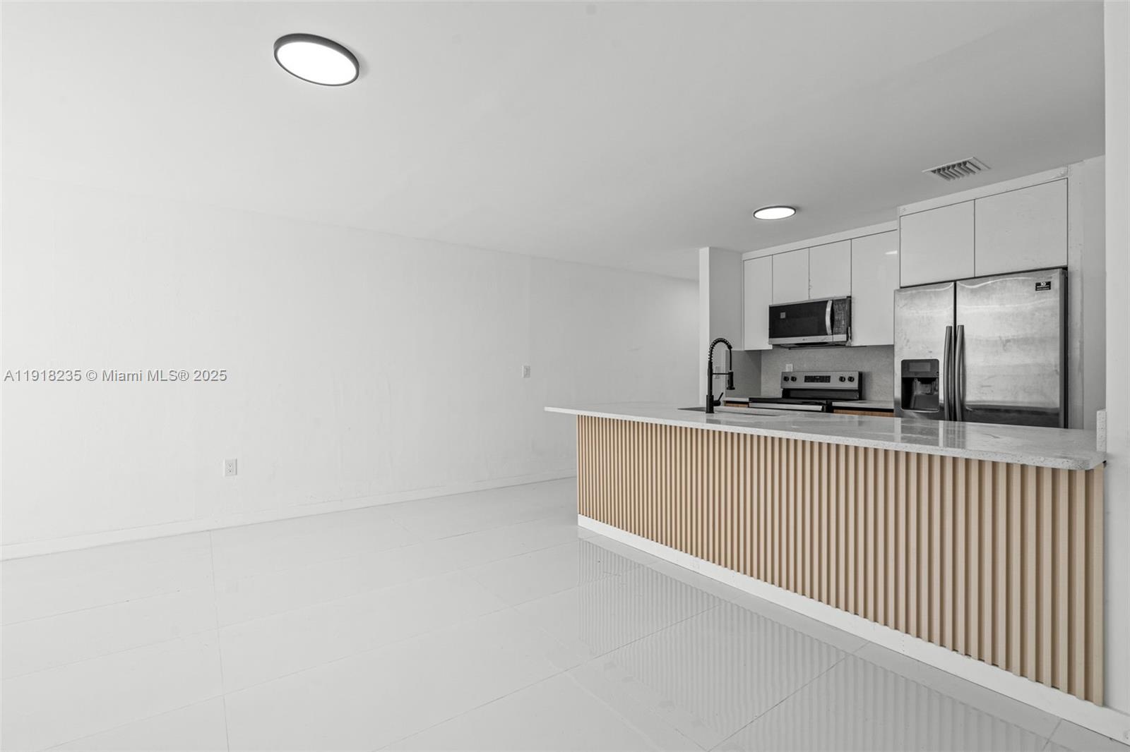 3956 Northwest 207 St Road Miami Gardens, FL 33055 - Photo 10 of 36 a view of kitchen with cabinets