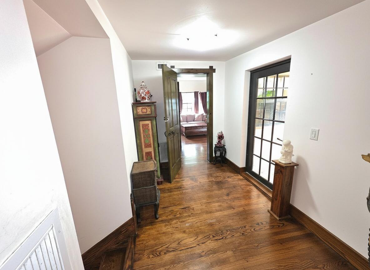 4200 North Surf Road Hollywood, FL 33019 - Photo 19 of 32 a view of entryway with wooden floor and stairs