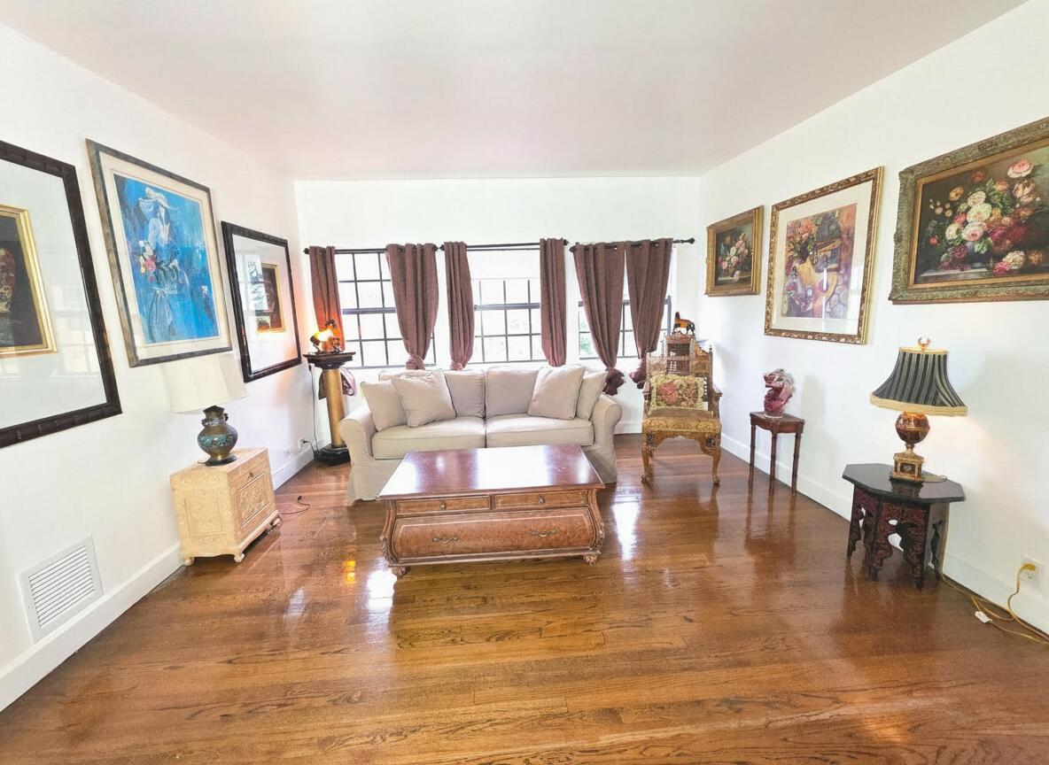 4200 North Surf Road Hollywood, FL 33019 - Photo 20 of 32 a living room with furniture and a fireplace