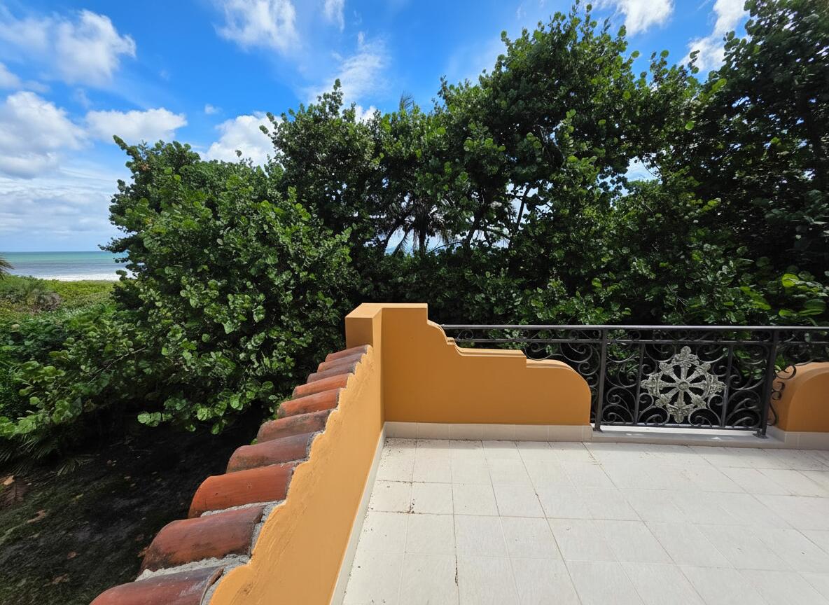 4200 North Surf Road Hollywood, FL 33019 - Photo 8 of 32 a view of roof deck with wooden floor and fence