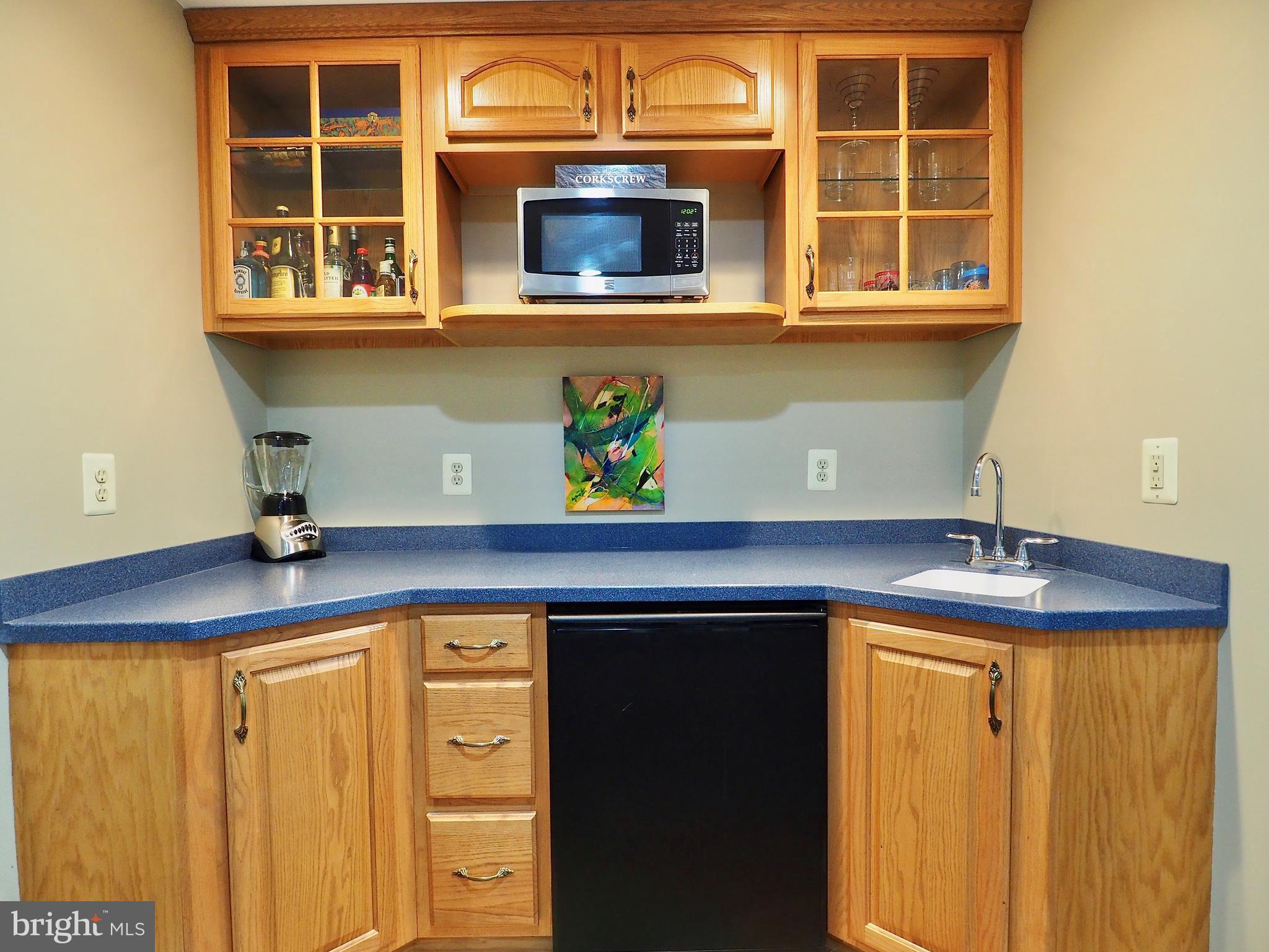 1312 Red Hawk Circle Reston, VA 20194 - Photo 40 of 48 Lower level with wet bar