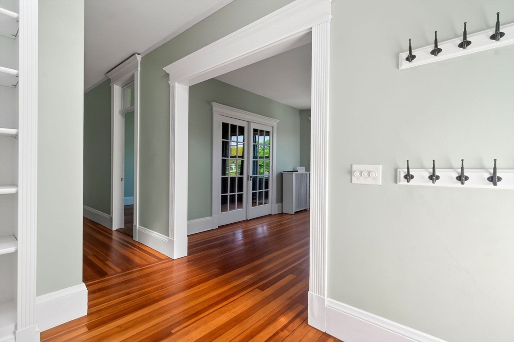 16 Garrison Road, Unit 5 Brookline, MA 02445 - Photo 9 of 14 a view interior of the house with wooden floor