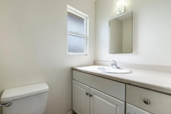 a bathroom with a shower and a bath tub