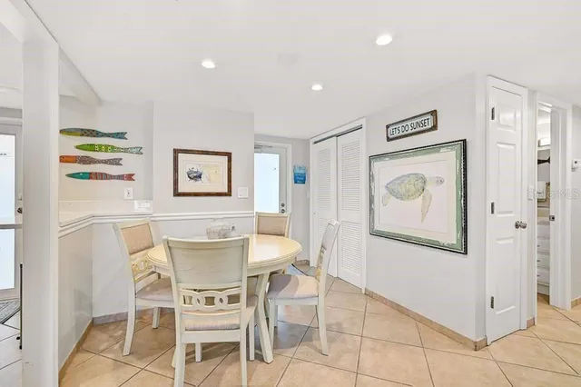 a view of a dining room with furniture